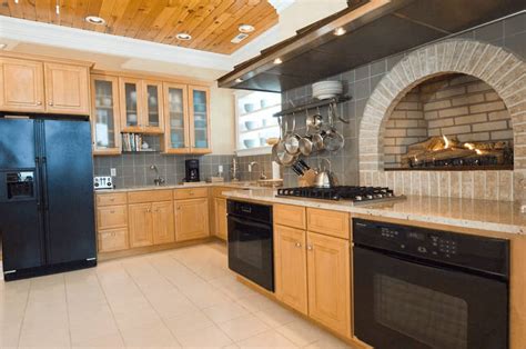 pictures of stainless steel appliances with oak cabinets|kitchen remodels with oak cabinets.